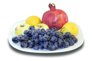 pomegranate, grape with apple and lemon photo