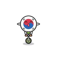 The cute south korea flag character is riding a circus bike vector