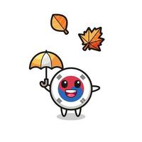 cartoon of the cute south korea flag holding an umbrella in autumn vector