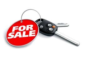 Car keys with keyring and currency symbol photo