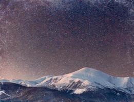 fantastic winter meteor shower and the snow-capped mountains. Vi photo