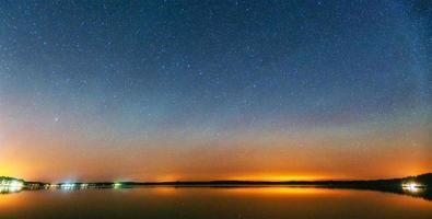 fantastic winter meteor shower and the snow-capped mountains. photo