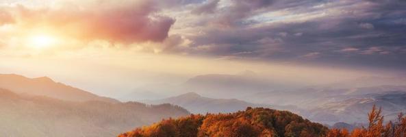 Waterfall in autumn sunlight. Beauty world. Carpathians. Ukraine. Europe photo