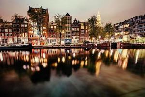 Beautiful night in Amsterdam.  illumination of buildings an photo