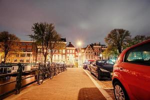 Beautiful calm night view of Amsterdam city photo