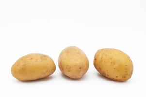 Potatoes isolated on white background photo