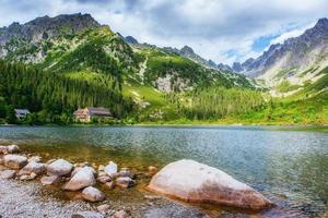 Majestic mountain lake in National Park High Tatra. Strbske ples photo