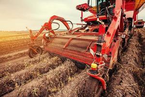 Tractor ploughing up the field. photo