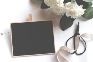 Small Chalkboard With Flower Bouquet. photo