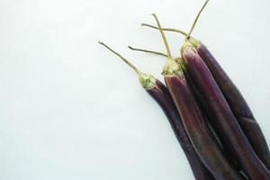 top view of eggplant on white background photo