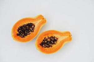 Exotic fruit papaya or papaw isolated on white background. Healthy eating dieting food. photo