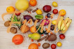 Exotic fruits with Fruits sign. Healthy eating dieting food background. photo