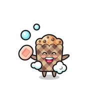 muffin character is bathing while holding soap vector