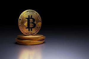 golden bitcoin on dark background photo