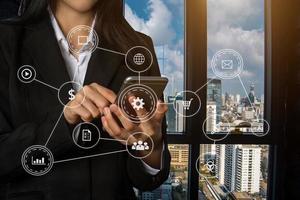 Businessman working with smart phone and laptop and digital tablet computer in  office with digital marketing media  in virtual icon photo