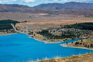 View of the town of Tekapo on the shore of Lake Tekapo photo