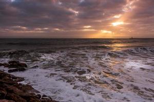 Sun Setting at Quarteira in Portugal photo