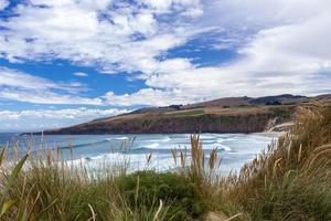 The pristine coastline at Sandfly Bay photo