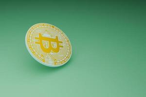 Minimal Bitcoin mining on green background photo