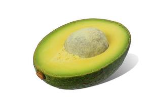 Avocado cut in half isolated on white background with clipping path. photo