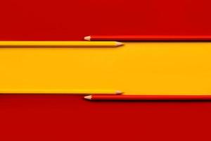 Spanish flag with yellow and red pencils photo