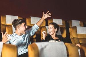 Caucasian man and woman business relax couple go to the cinema after work. photo