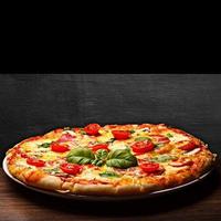 Delicious freshly baked pizza just out of the oven, Italian food,