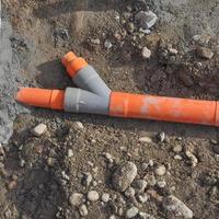 Plastic pipes in a construction site photo