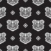 Tiger face seamless pattern in Maori style. Boho tiger face. Good for clothing and textiles. Vector