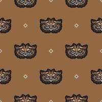 Seamless pattern with owls in boho style. Vector