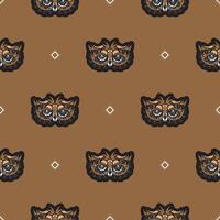 Seamless pattern with owls in boho style. vector