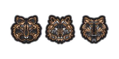 Boho style tiger print set. Polynesian style tiger face. Exclusive handcrafted design. Isolated. Vector