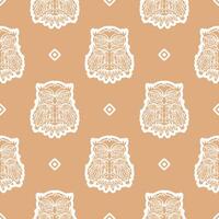 Seamless background with owls. Exotic bird in boho style. Vector illustration.