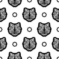 Black and white Seamless pattern with tiger face in boho style. Polynesian style tiger face. Good covers, fabrics, postcards and printing. Vector illustration.