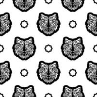 Black and white Seamless pattern with tiger face in boho style. Polynesian style tiger face. Good covers, fabrics, postcards and printing. Vector illustration.