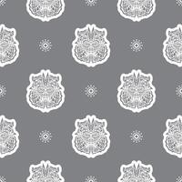 Seamless pattern with a lion's head in a simple style. Good covers, fabrics and printing. Vector illustration.