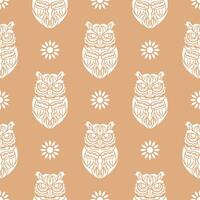 Simple owl seamless pattern in boho style. Good for backgrounds, prints, apparel and textiles. Vector illustration.