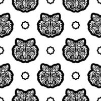 Black and white Seamless pattern with tiger face in Polynesian style. Good for garments, textiles, backgrounds and prints. Vector illustration.