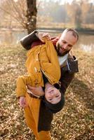 Happy family is playing in nature. photo