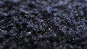 Wide macro horizontal shot of fabric as background with copy space. Textile super close-up with selective focus. photo
