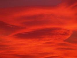 red sunset sky with clouds background photo