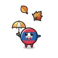 cartoon of the cute laos flag holding an umbrella in autumn vector