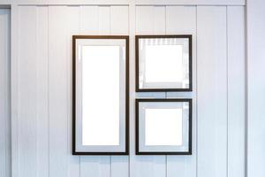 Group of Blank photo frames on the wall for your design, Mock up concept