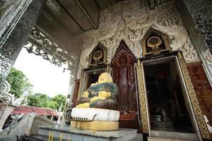 Buddha image enshrined in front of the church at the temple in Ban Kha District Ratchaburi Province, Thailand