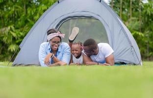 Cheerful african american family enjoying in the park, Happiness family concepts photo