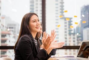 Success and Teamwork concept, Group of young business team meeting, Happy group of business people clapping in office photo