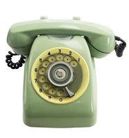 Vintage green telephone isolated on white background with clipping path photo