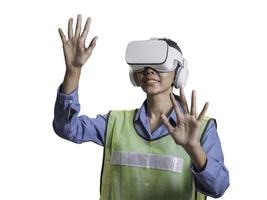 Asian Female warehouse supervisor using virtual reality headset doing inventory counting in the warehouse. The concept of modern technologies