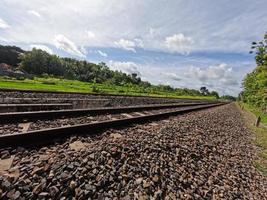 The view of the rail road in Yogyakarta Indonesia, visible rocks and a clear sky background