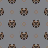 Seamless pattern with tiger face in colored boho style. Polynesian style tiger face. Good covers, fabrics, postcards and printing. Vector illustration.